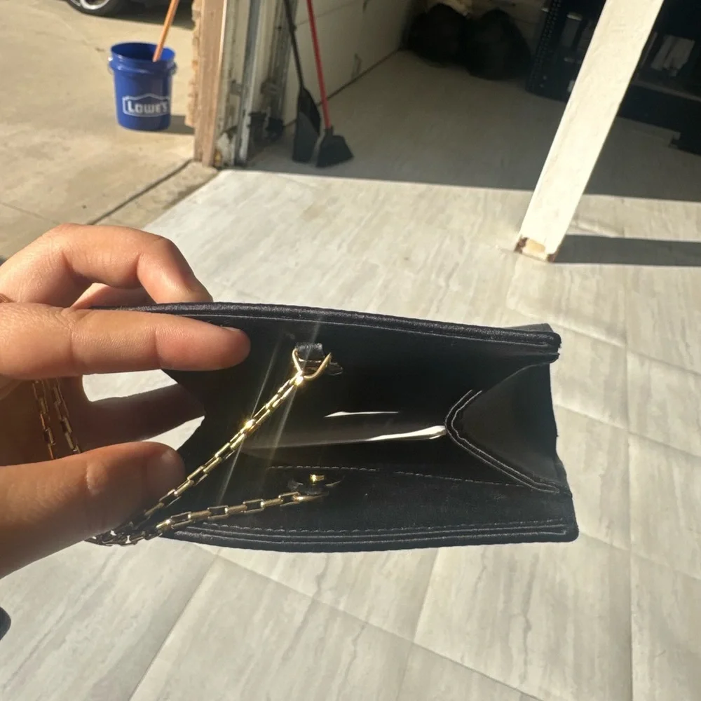 Yves Saint Laurent Black Clutch with Gold Logo and Red Details - Picture 6 of 7
